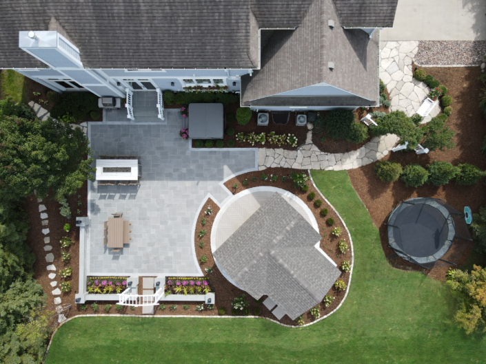 Pewaukee Nightscape Patio & Fireside Retreat with Stunning Pavilion After Hardscape Renovation