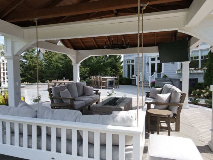 Pewaukee Nightscape Patio & Fireside Retreat with Stunning Pavilion After Hardscape Renovation