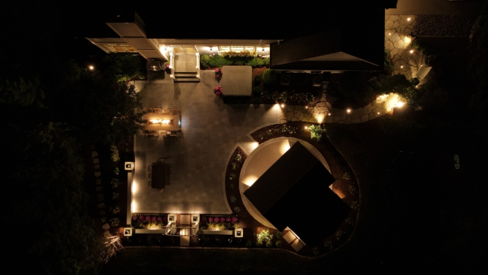Pewaukee Nightscape Patio & Fireside Retreat with Stunning Pavilion After Hardscape Renovation