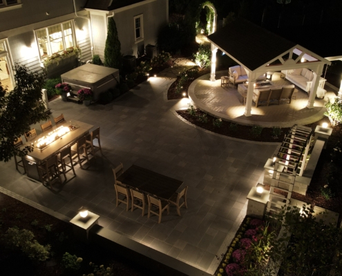 Pewaukee Nightscape Patio & Fireside Retreat - After Hardscape Renovation