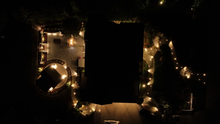 Pewaukee Nightscape Patio & Fireside Retreat with Stunning Pavilion After Hardscape Renovation